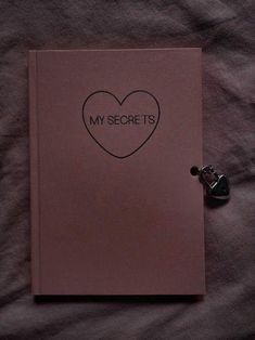 a book with the words my secrets written on it