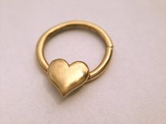 Hey, I found this really awesome Etsy listing at https://www.etsy.com/listing/239438165/golden-heart-septum-ring-heart-nose-ring Nickel-free Gold Septum Ring For Gift, Tiny Gold Septum Ring As Gift, Tiny Gold Septum Ring Gift, Dainty Gold Septum Ring As Gift, Heart Septum, Heart Nose Ring, Heart Nose Rings, Septum Hoop, Nose Rings Studs