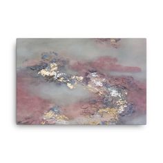 an abstract painting in pink and gold with white frame on the left hand side, it is