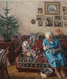 an old woman sitting on a couch next to a christmas tree