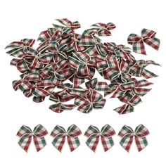 small red and green plaid bows with matching clippings on each side, set against a white background