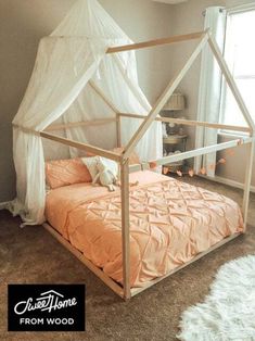 a bed with a white canopy over it