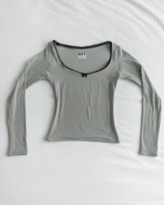 * All preorders for this item ship within 1-2 weeks! Handmade gray long sleeve top Super soft and stretchy Sweetheart neckline Double layered front bodice for extra coverage and shape Model is wearing a size S Free U.S. shipping! 2000 Tops, Cute Long Sleeve Shirts, Cute Long Sleeve Tops, Cute Long Sleeves, Gray Clothes, Tops With Sleeves, Long Sleeve Top Outfit, Handmade Tops, Double Layer Top