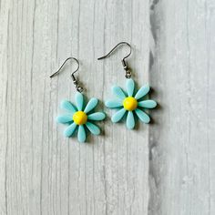 This simple, cute and lightweight earring is great for everyday wear, also it is a perfect gift for the person loves flowers 📌 You will receive one pair of the earring  📌 Each pair of earrings come with clear silicone backs  📌 Color of the earring cards & packing bags varies pending what I have in stock! 📌All order will be shipped within 1-3 business days of purchase  📌All order are handing with great care and checked thoroughly before it is shipped to you  ❗️ENJOY FREE STANDARD DOMESTIC SHIPPING WHEN YOU SPEND $35+  ❤️Favorite my shop for updates on new items or sale event ❤️ Thanks for visiting my shop, hope you find something you like, my goal is to make you smile when you receive your order ❤️ Everyday Single Dangle Flower Earring, Cute Hypoallergenic Flower-shaped Earrings, Cute Flower Shaped Hypoallergenic Earrings, Everyday Flower Charm Drop Earrings, Everyday Dangle Earrings With Flower Charm, Trendy Dangle Flower Earrings, Trendy Dangle Flower Earrings With Ear Wire, Everyday Drop Earrings With Flower Charm, Adjustable Flower Shaped Earrings For Everyday