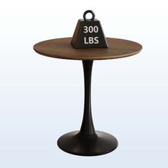 a small table with a sign on it that says 300lbs sitting on top