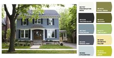 a blue house with white trim and black shutters