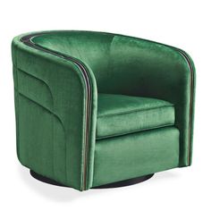 a green chair sitting on top of a white floor