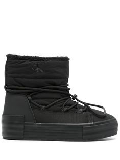 black logo print to the side round toe drawstring fastening ankle-length platform sole flat rubber sole Calvin Klein High-top Leather Sneakers, Calvin Klein Black Round Toe Boots, Calvin Klein Padded Open-toe Heels, Farfetch Black Bag, Black Leather Boots Farfetch, Platform Ankle Boots, Shoes With Jeans, Black Logo, Calvin Klein Jeans