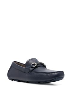 Gancini-buckle loafers from SALVATORE FERRAGAMO featuring leather, Gancini buckle, ridged rubber sole, round toe, slip-on style and marine blue. This item is in size 7 and the color is Blue Luxury Classic Blue Loafers, Luxury Men's Loafers With Horsebit Detail, Luxury Blue Men's Loafers, Luxury Slip-on Driving Loafers, Luxury Slip-on Loafers With Buckle Closure, Sporty Women, Buckle Loafers, Classic Women, Salvatore Ferragamo Shoes