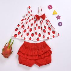 Material:Polyester Thickness:Regular Package included:2 Pieces Season:Summer Sales 2-piece Strawberry Printed Tops & Solid Shorts for Toddler Girl Wholesale children's clothing,which is very comfortable to wear it.Fashionable high quality organic and affordable clothes 2-piece Strawberry Printed Tops & Solid Shorts for Toddler Girl Wholesale children's clothing that will always catch the attention of people.2-piece Strawberry Printed Tops & Solid Shorts for Toddler Girl Wholesale children's clot Summer Cotton Sets With Strawberry Print, Casual Strawberry Print Sets For Spring, Summer Matching Sets For Playtime, Red Sleeveless Vacation Set, Cute White Summer Sets, Cute Pink Strawberry Print Sets, Matching Spring Playwear Sets, Cute Pink Short Set For Summer, Cute Sleeveless Sets For Vacation