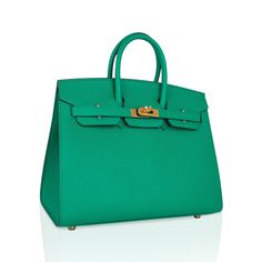 Hermes Birkin Sellier 25 bag featured in coveted Vert Jade.Lush with Gold hardware.This exquisite bag is modern and minimalist.A sleek pared down version that exudes chic sophistication.Epsom leather and the signature sellier edges create a work or art.NEW or NEVER .Comes with the lock and keys in the clochette, sleepers, signature Hermes box.Mightychic shares your passion for exquisite and whimsical Hermes creations and provides you access to that one single item, or to build a superior collection with discreet personal service.final sale BAG MEASURES:LENGTH 25cm / 9.75" TALL 18 1/2cm / 7.25"DEEP 13cm / 5.25" HANDLES:TALL 3" CONDITION:NEW or NEVER Will be delivered with Box, dust bag, card, booklet and receipt Exchange Accepted in this cases :/p> Hermes Birkin Sellier, Birkin Sellier, Hermes Birkin 25, Hermes Box, Birkin 25, Gold Ounce, Lock And Key, Hermes Birkin, High Quality Leather