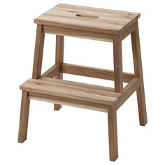 a wooden step stool sitting on top of a white background