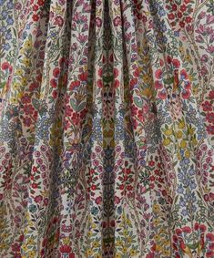 an image of a dress with flowers on it