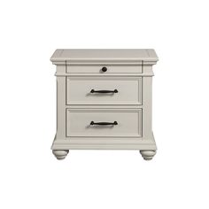 a white nightstand with two drawers on it