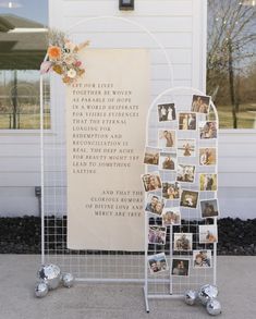 a sign with pictures on it next to a white fence and flowers in vases