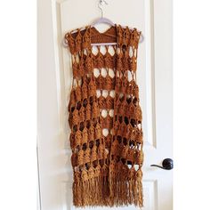 Do you love boho style? If so this vest is for you white and spring colors with fringe. ~~Measurements~~ 40 inches long (including fringe) ~~Size~~ S/M Please feel free to message me for custom colors and sizes. I love to crochet. Bohemian Crochet Top With Crochet Trim For Fall, Bohemian Vest For Beach And Spring, Bohemian Style Vest For Beach In Spring, Sleeveless Crochet Top With Crochet Trim For Fall, Bohemian Vest For Beach In Spring, Fall Sleeveless Crochet Top With Crochet Trim, Bohemian Crochet Top For Fall, Bohemian Crochet Vest Top For Summer, Bohemian Crochet Top With Tassels For Vacation