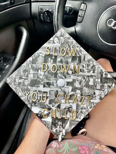 a graduation cap that says slow down you're crazy child