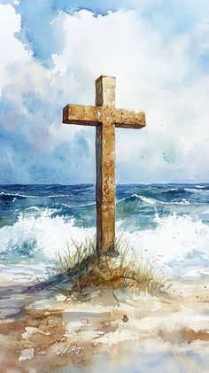 a watercolor painting of a cross in the sand at the ocean's edge