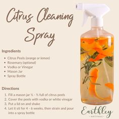 a bottle of citrus cleaning spray with oranges in it