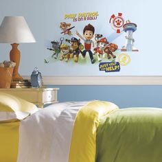 a child's bedroom with toy story wall decals