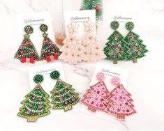 🎄🎄Charismas Tree Series 🎄🎄 A. Length: 2 3/4 inch Width: 1 3/4 inch Quantity: two pieces / one pair B. Length: 3 1/4 inch Width: 2 1/4 inch Quantity: two pieces / one pair C.  Length: 3 inch Width: 2 inch Quantity: two pieces / one pair D. Length: 3 inch Width: 1 3/4 inch Quantity: two pieces / one pair E. Length: 3 inch Width: 2 inch Quantity: two pieces / one pair ❤️Buy Any 5 Items get extra 15% off at check out❤️ ✨✨ Code: BUY5OFF15 ✨✨ 🚛 Purchase any items over $35 get free shipping🚛 All items are ready to ship within 48 hours (excluding weekends and holidays) The item is packaged ready to gift in a jewelry box Green Beaded Earrings For Christmas, Green Beaded Earrings For Christmas Party, Christmas Dangle Beaded Earrings With Colorful Beads, Christmas Colorful Beaded Dangle Earrings, Festive Christmas Beaded Earrings, Christmas Beaded Earrings As Gift, Christmas Gift Beaded Earrings, Christmas Party Beaded Earrings With Round Beads, Christmas Beaded Round Earrings