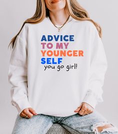 Empower yourself and others with this inspirational "Advice to my younger self: You go girl" crewneck. This motivational tee is designed to boost self confidence and encourage female empowerment. Perfecct for any woman who wants to wear her feminist fashion with pride. Whether you're looking for an inspiring quote shirt or a piece of empowering clothing, this sweatshirt makes a bold statement. Ideal for casual wear or as a thoughtful gift, this women's apparel piece reminds everyone to embrace t Inspirational Advice, To My Younger Self, Womens Empowerment, Feminist Fashion, Younger Self, Self Love Club, Love Club, Go Girl, You Go Girl