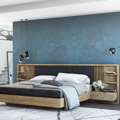 a bedroom with a bed, nightstand and bookcases in front of a blue wall