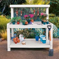 a garden stand with potted plants and gardening utensils