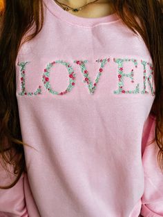 Using a light mint green, baby blue, hot pink, soft pink, and yellow threads, this sweet flowers design spells LOVER. A perfect Valentine's Day sweatshirt! Sizing: -Unisex fit. Please check the guidelines for measurements. Sweatshirt is a pink color and is 50% cotton / 50% polyester Care instructions: Wash inside out in cold water, tumble dry low. Do not bleach. Colors may appear slightly different on screen as it does in person due to the different display ranges. I try my best to correctly show each item, but know that there might be slight variations. There are no returns, but if there is an issue with your order, please message me! Thank you for shopping my small business! Feel free to reach out with any questions. Valentines Day Sweatshirt, Plant City, Sweet Flowers, Light Mint Green, Flowers Design, Green Baby, Pink And Yellow, Soft Pink, Flower Designs