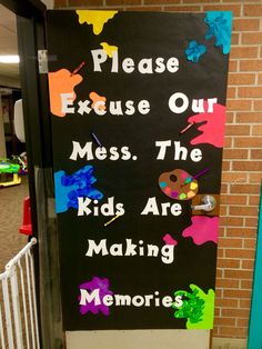 a sign that says please excuse our mess, the kids are making memories