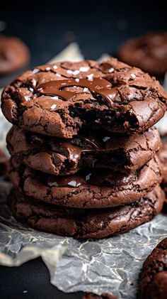 a stack of chocolate cookies sitting on top of each other