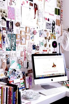 an apple computer sitting on top of a desk