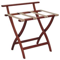 a wooden stand with two black bars on it's sides and one is holding a magazine rack