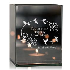 a glass block with candles in it and the words you are my happily ever after