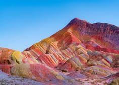 the colorful mountains are painted with different colors