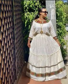 Beautiful Ethiopian and Eritrean Habeshan Dress. Stylish Menen, 100% Cotton. PLEASE LEAVE YOUR PHONE NUMBER FOR DELIVERY PURPOSES. THANK YOU.