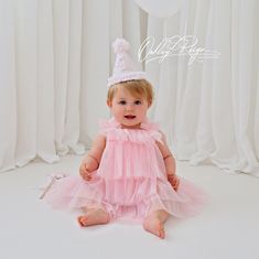 Introducing our beautiful "Aurora" pink candy embroidered lace party hat and matching star wand set, a charming duo that will add a touch of elegance and whimsy to any little girl's celebration. The party hat, crafted with love and attention to detail, features a delicate daisy lace overlaid on pastel pink, hand dyed linen fabric. The pink chiffon trim and pompom adds a delicate and feminine touch.  Party Hat: Luxurious lace daisy floral embroidery pattern overlaid onto pink linen. Pink chiffon Princess Cake Smash, Pink Princess Cake, Pink Princess Cakes, 1st Birthday Party Hat, Star Wand, Hat Outfit, Birthday Party Hats, Floral Embroidery Patterns, Girls Dress Up