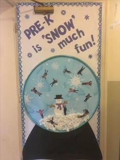 a plate with snowmen on it is in front of a sign that says pre - k, snow is much fun