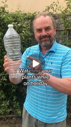 a man holding up a water bottle with the caption saying, watering your plants while on holiday