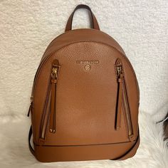 New Never Used Brown Backpack With Gold-tone Hardware For Daily Use, Brown Leather Backpack With Gold-tone Hardware, Brown Backpack With Gold-tone Hardware For Travel, Michael Kors Travel Bag, Michael Kors Backpack, Uniqlo Bags, Brown Leather Backpack, Bags Michael Kors, Michael Kors Crossbody Bag