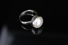 Real pearl ring, Set in sterling silver, This freshwater pearl is White or cream color. This round pearl ring can be an engagement to cocktail ring. This Pearl Ring on Etsy is made to size. The Pearl is Birthstone for June. It's cream color represents purity, generosity, integrity and loyalty. Though classified as a gemstone, pearls are extremely unique, largely due to the fact that they are the only gem material formed and found within a living creature. ... A large amount of nacre that forms a Studs For Men, Real Pearls, August Birth Stone, Drop Pendant, Cocktail Ring, Pearl Ring, Cocktail Rings, Silver Wire, Ring Set