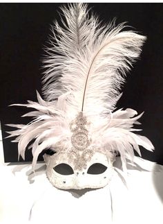 "Bride Mask- Diner en Blanc- Silver Feather mask- NYC Masked ball- New Years Eve- Masquerade Ball- Mardi Gras -Halloween Hello, Perfect for a masquerade party- birthday celebration, New Years Eve celebration, or Mardi Gras. This ostrich feathers are in the middle with a clear rhinestone piece which measures 2x 4.5\". Pearls and rhinestone are added so it has great bling! The feathers are about 10inches. The lower feathers are 11 inches wide. Masks can be made in special order colors also. Can be White Venetian Mask For Costume Party, Venetian White Mask For Costume Party, Fantasy Masquerade Mask For Wedding And Mardi Gras, White Venetian Mask For Costume, Full Face Fantasy Masquerade Mask For Costume Party, Fantasy Full Face Masquerade Mask For Costume Party, Fantasy Full-face Masquerade Mask For Costume Party, White Eye Mask For Costume Party, White Masquerade Masks For Carnival