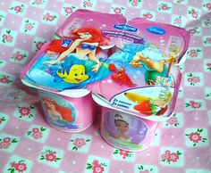 the little mermaid lunch box is open and ready to be packed into its own containers