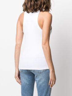 Find ANINE BING Eva Organic Cotton Tank Top on Editorialist. white stretch-organic cotton fine ribbed stretch-design round neck sleeveless racerback straight hem POSITIVELY CONSCIOUS: At least 50% of the main material of this product meets our conscious criteria. For example, it's either organic, recycled, upcycled or independently recognised as being better for the environment (such as linen, ramie, TENCEL™ etc.). Stretch Cotton Racerback Tops, Fitted White Tank Top For Everyday, Fitted Elastane Vest For Spring, Fitted Racerback Tops In Elastane, Fitted Racerback Elastane Tops, Fitted Elastane Racerback Tops, White Fitted Crew Neck Vest, Fitted White Crew Neck Vest, Sporty Fitted Crew Neck Vest