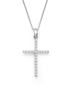 A straightforward yet elegant diamond cross pendant necklace cast in 14K white gold. Diamond White Cross Pendant Necklace With Brilliant Cut, Classic Diamond Cross Necklace For Formal Occasions, Classic Diamond Cross Necklace In Diamond White, White Gold Diamond Cross Pendant Necklace With Pavé Setting, Classic Diamond White Diamond Cross Necklace, Classic Diamond White Cross Necklace, White Gold Diamond Cross Pendant Necklace, Formal Diamond Cross Necklace With Brilliant Cut, Formal Crucifix Necklace With Brilliant Cut