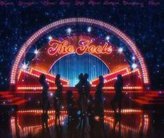 the cast of dancing on stage in front of an arch that says'the feels '