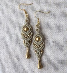 Beautiful Macrame Earrings brass beads. Raw Brass posts. Waterproof and non tarnish. Unique Gold Macrame Jewelry, Adjustable Teardrop Earrings With Gold Beads, Unique Gold Jewelry With Macrame, Beige Teardrop Bohemian Jewelry, Bohemian Beige Teardrop Jewelry, Beige Bohemian Teardrop Jewelry, Gold Macrame Earrings For Gift, Handmade Beige Drop Earrings, Nickel-free Beige Bohemian Jewelry