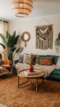 a living room filled with lots of furniture and decor on top of a brown rug