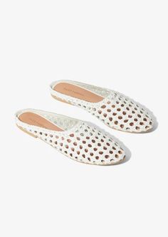 SHANTI - WHITE LEATHER MULES – salt + umber Leather Slip-ons With Woven Sole For Summer, White Flat Slip-ons For Summer, White Slip-ons For Beach In Spring, Casual White Slip-on Mules, White Slip-ons With Rubber Sole For Summer, White Slip-on Sandals For Spring, White Slip-ons With Perforated Toe Box, White Spring Clogs With Flat Heel, Casual Woven Leather Mules With Flat Heel