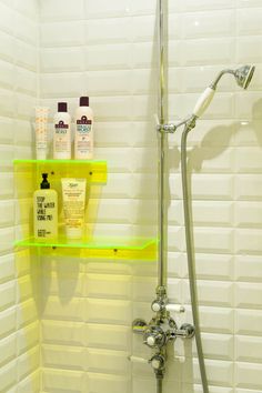 the shower is clean and ready to be used for someone's daily care needs